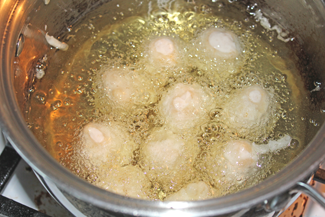 balls frying in pot